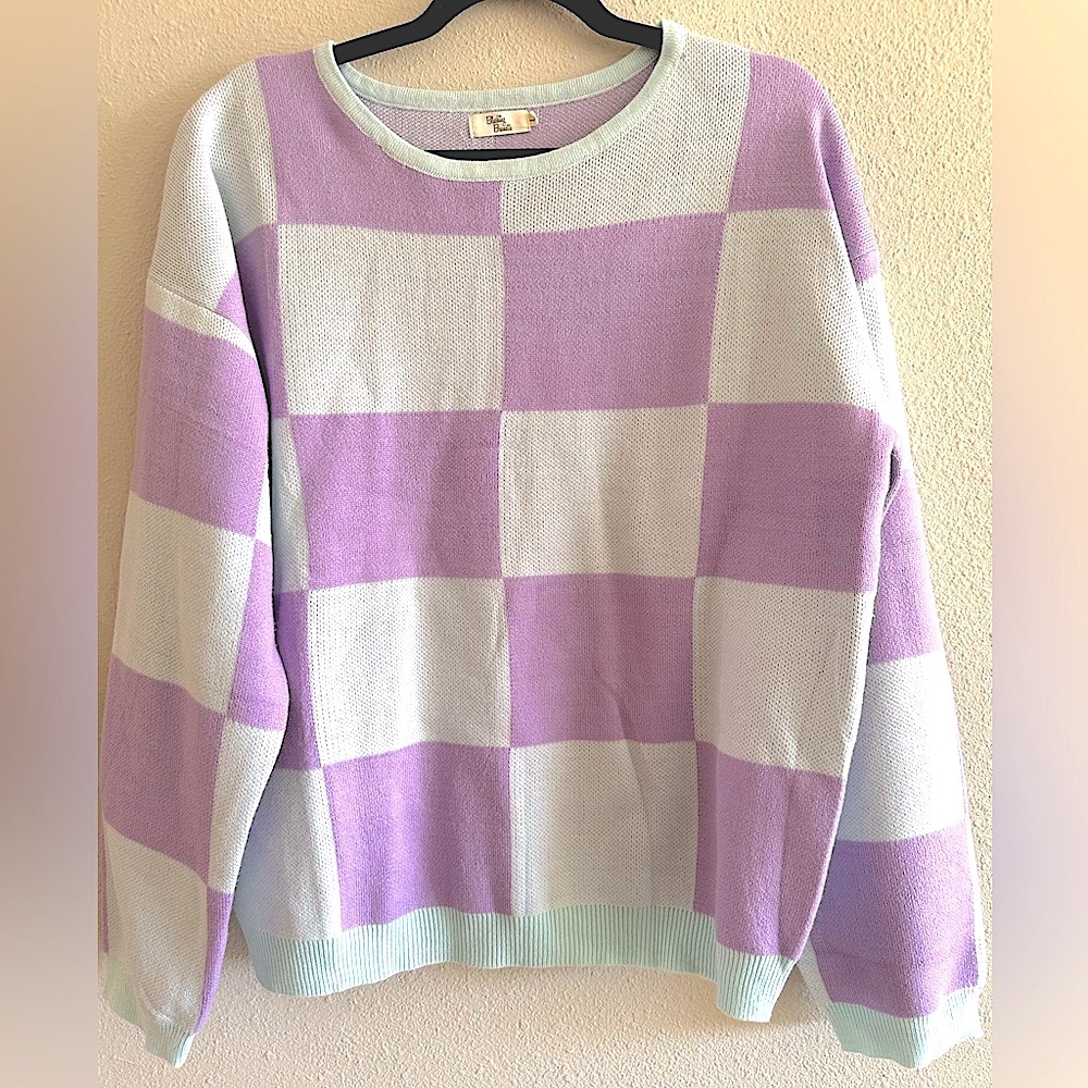A4 - 217 Blushing brunette light blue and purple checkered sweater size large